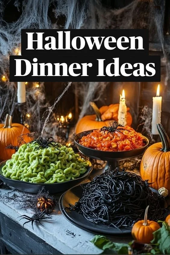 A table set for a spooky Halloween dinner with festive dishes and decorations