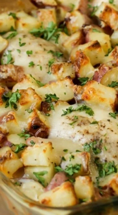 Delicious Chicken Potato Bake served in a dish with herbs and spices.