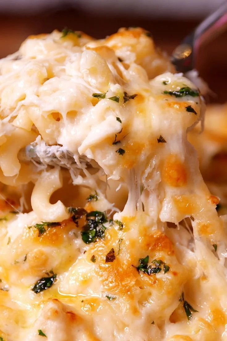 Delicious crab mac and cheese topped with breadcrumbs and herbs