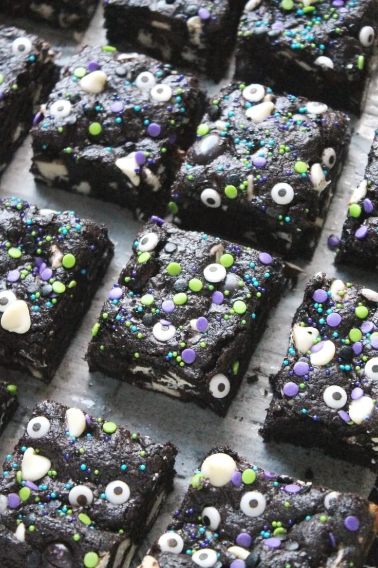 Dark chocolate cookies and cream monster bars topped with chocolate