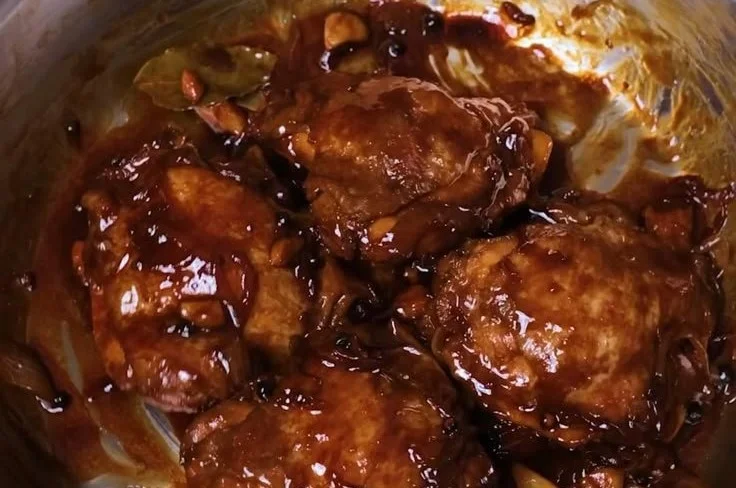 Deliciously cooked Filipino Chicken Adobo served with rice