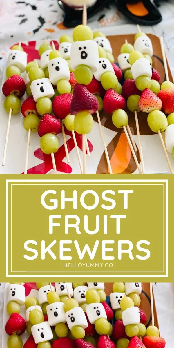 Spooky ghost fruit skewers arranged for a Halloween snack party
