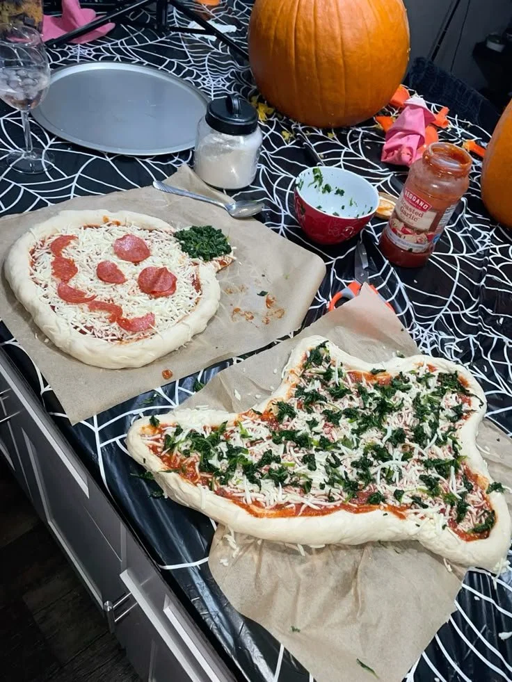 Delicious Halloween ghost pizza with spooky toppings and festive decorations.