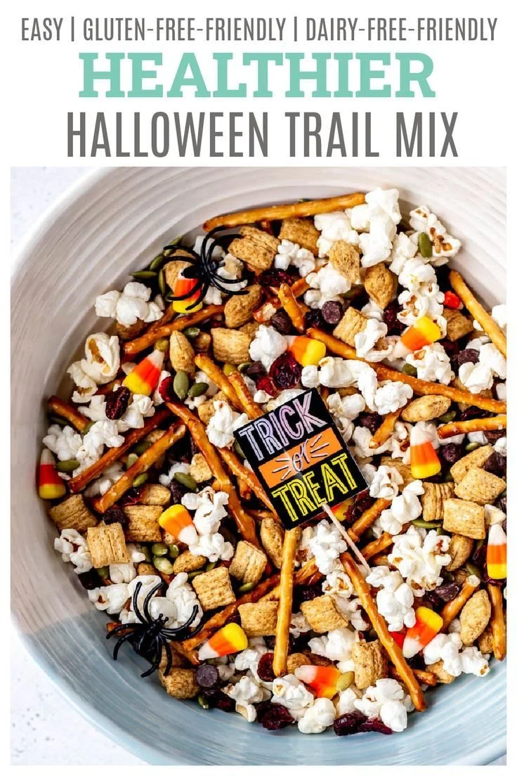 Colorful Halloween Trail Mix featuring popcorn, candy, and seasonal treats.