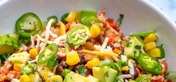 Healthy Crockpot Mexican Chicken Bowls with avocado and corn salad