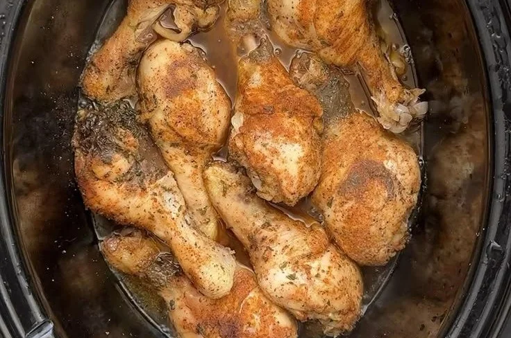 Delicious slow cooker chicken legs cooked to perfection with herbs and spices.