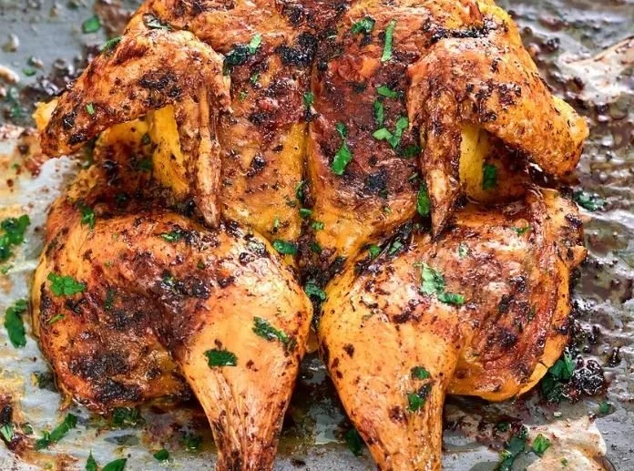 Super juicy and crispy chicken served with sides on a plate