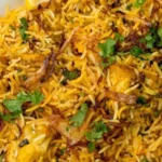 tender chicken fluffy rice biryani 2026 07 23 062751 477x1024 1